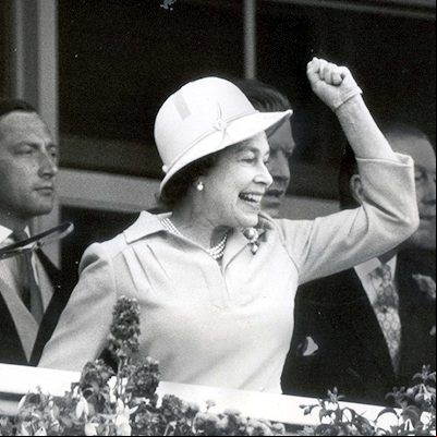 Black and white image of The Queen cheering in 1978