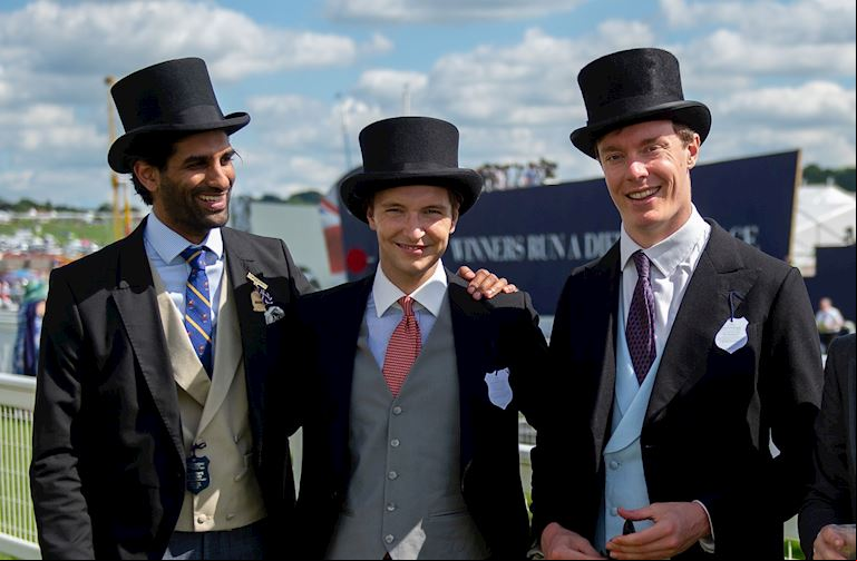 Three men in the Queen