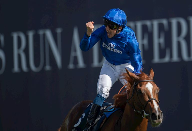 William Buick punching the air on Derby winner Masar